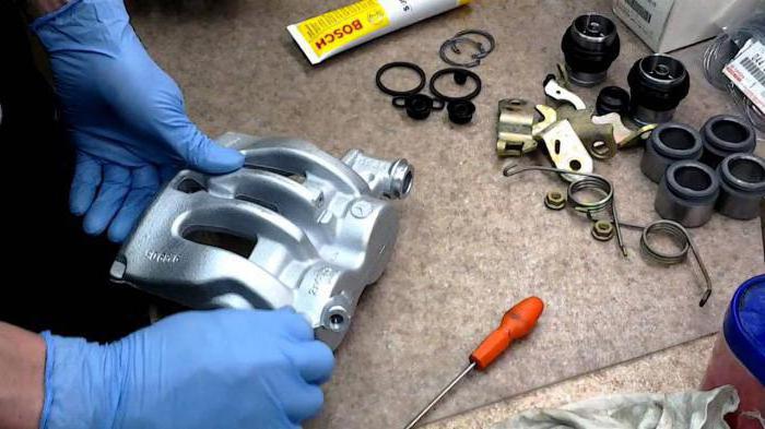 Brake caliper rear and its repair. Piston caliper brake rear