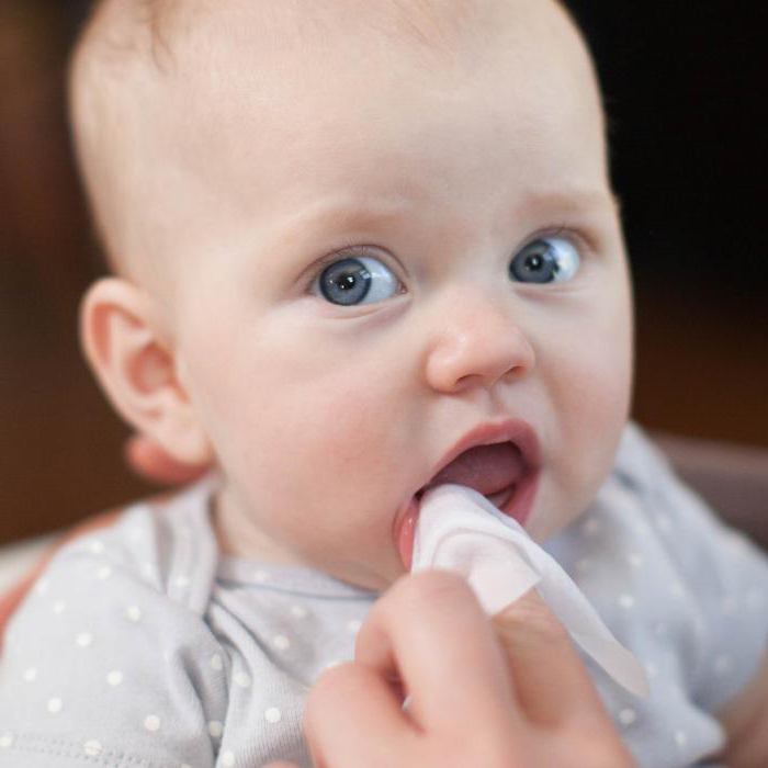 from what age can a child brush his teeth