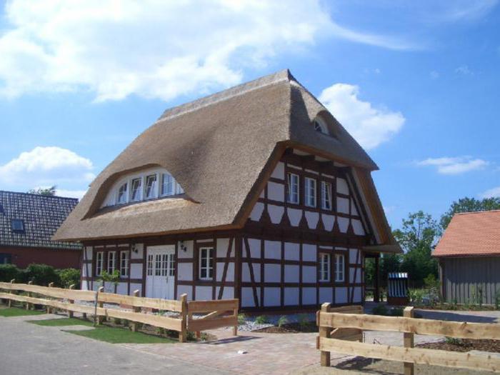 Frame houses 7x9 with a mansard and a broken roof one-storey