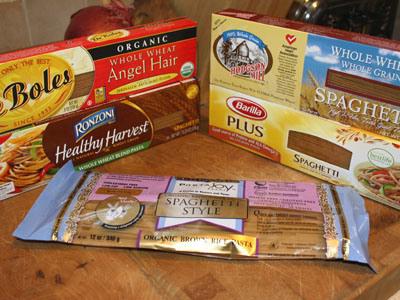 Whole-grain pasta and their benefits. Stamps of whole grains macaroni