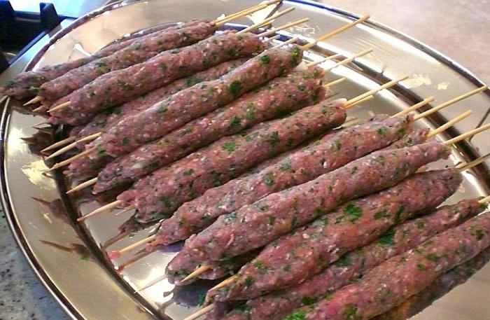 Lulya-kebab in a frying pan