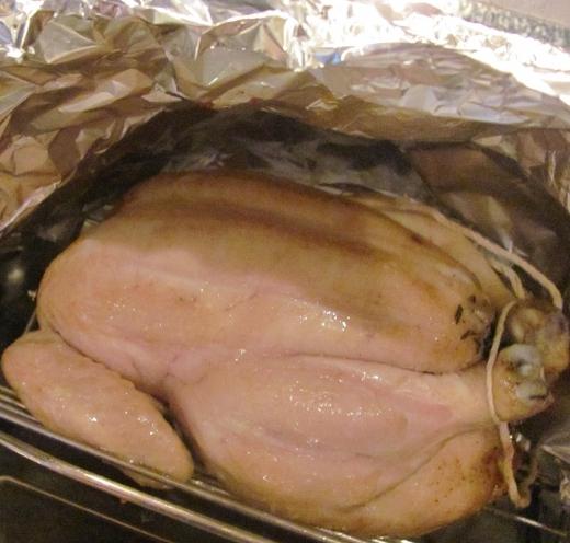 chicken in the oven under the foil