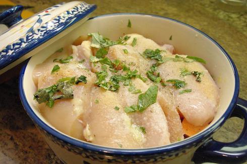chicken in a pot in the oven 