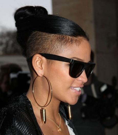 Fashion trends in hairdressing. Shaved whiskey in short and long female haircuts