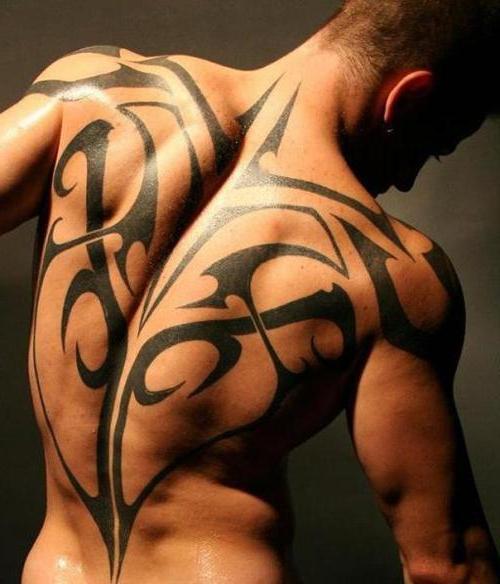 sketches of tattoos on the back of a man 