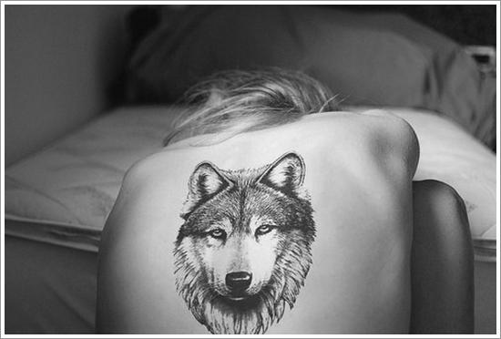 Freedom, will and devotion - the value of a tattoo wolf